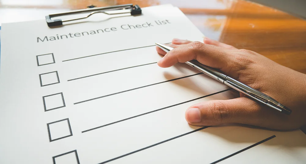 A blank maintenance checklist on a clipboard.