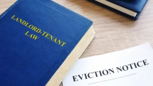 Eviction paperwork and copy of landlord tenant law book